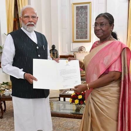 President Droupadi Murmu handing the letter of appointment to the Prime Minister of India