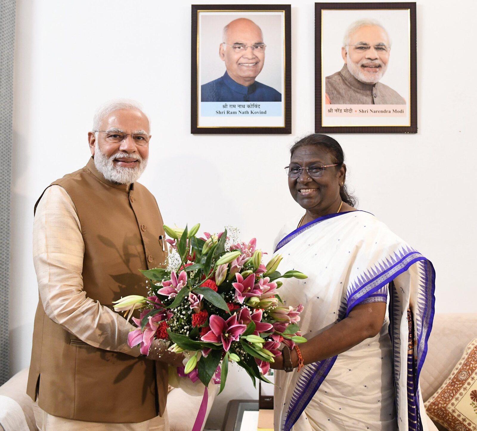 Droupadi Murmu with Prime Minister Narendra Modi at a formal meeting