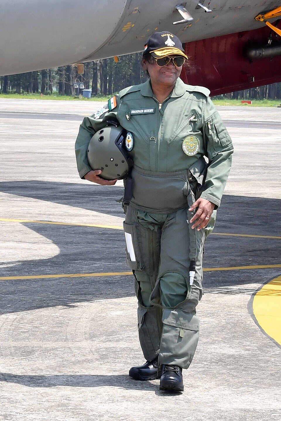 President Droupadi Murmu in a flight suit beside a Sukhoi-30 MKI at Tezpur Air Force Station, Assam